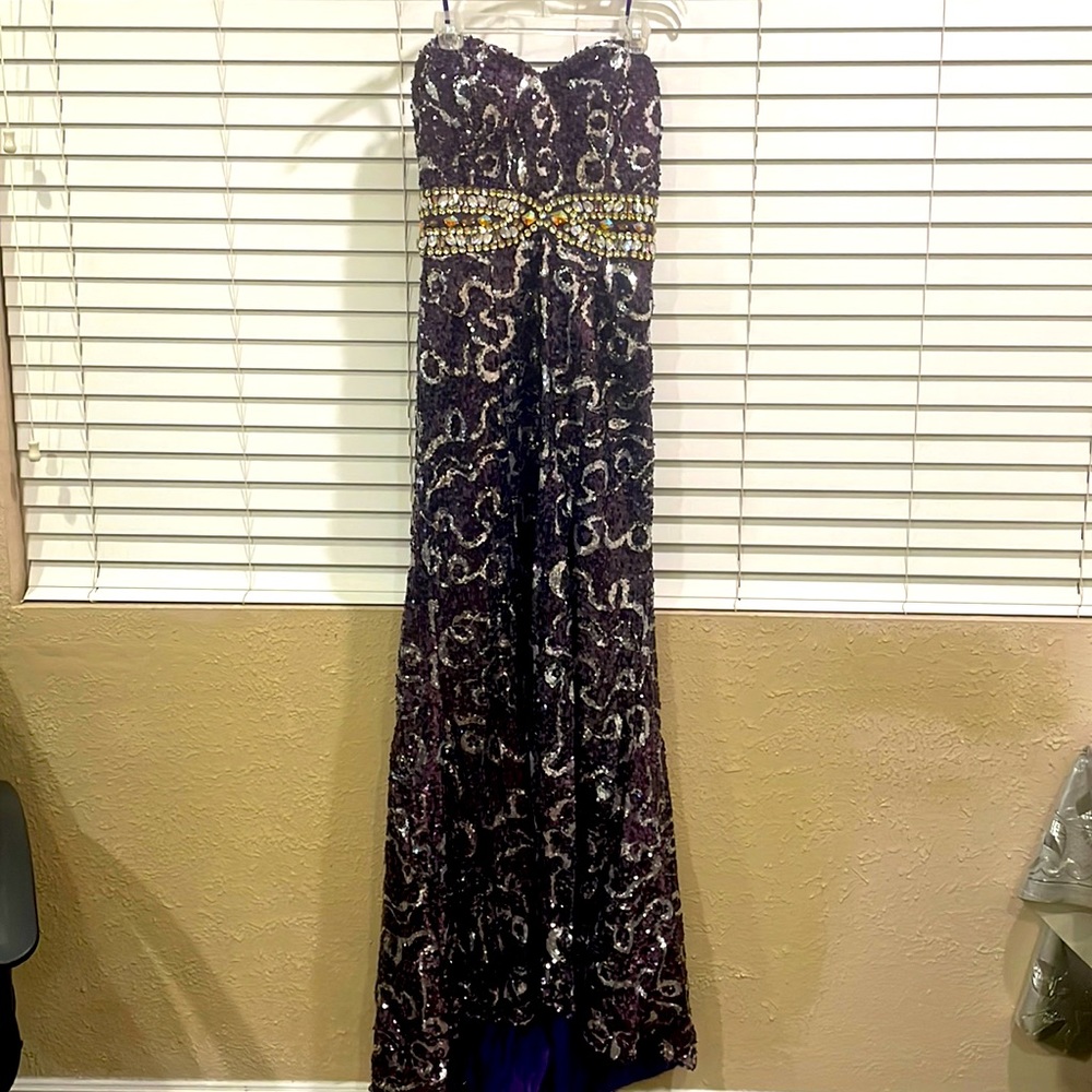Purple Prom dress with slit, decorative and colorful  crystals.Size 14, runs 12